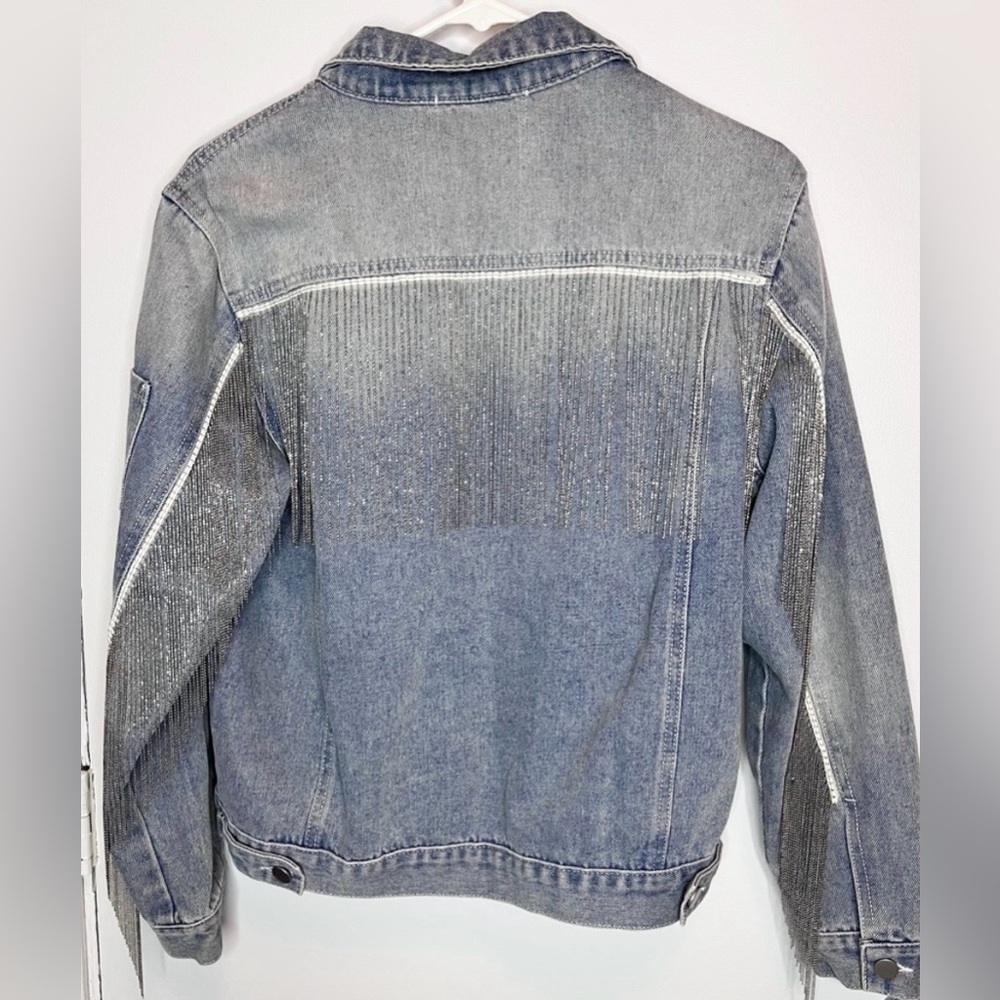 Light blue denim jacket with silver fringe detail